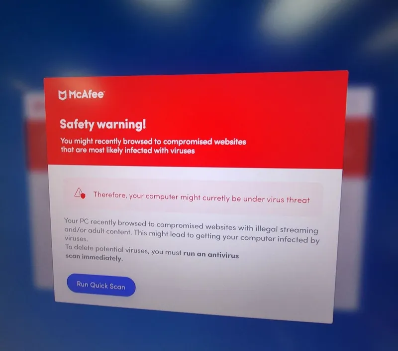 Fake antivirus warning popup on a computer screen, a common scam we remove for seniors