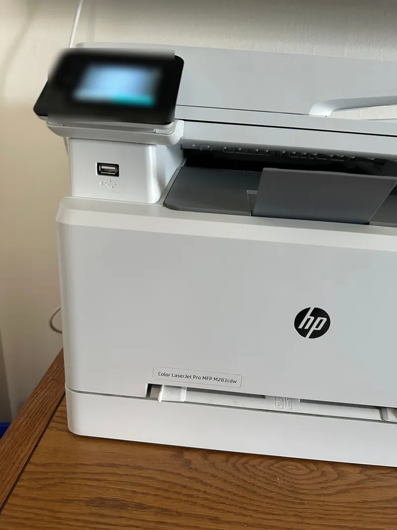 HP all-in-one printer being connected to home wifi during a setup visit